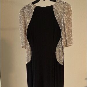Exscape black gown with sequin sleeves